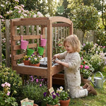 Child playing with gardening tools and plants in a garden setting