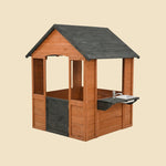 Wooden playhouse with a sink on a beige background